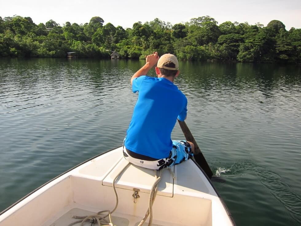 Paddling the motorboat home in Bocas del Toro Panama
