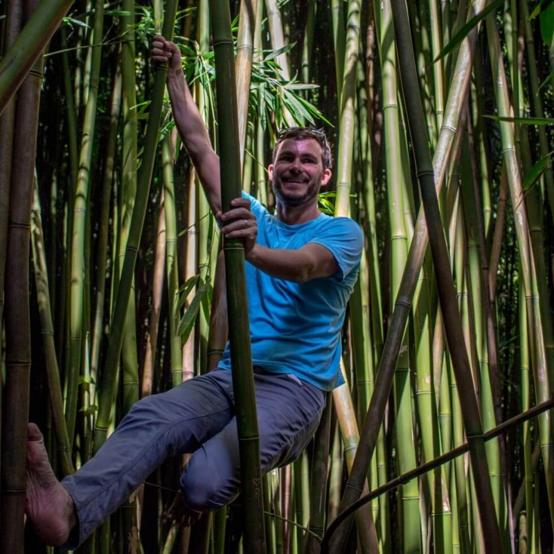 Tom climbing Bamboo on Pipiwai Trail Maui