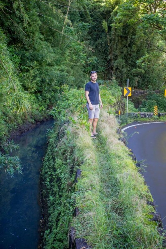 Tom exploring an old sugar cane canal road to Hana Maui